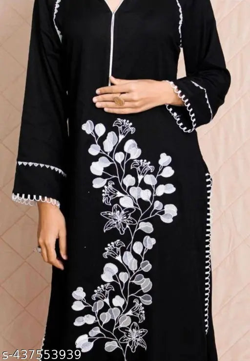 Black rayon embroidered Pakistani kurta pant set, three-quarter sleeves, pack of 2, various sizes available. Embroidered net design, coordinating women's fashion from India