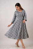 Grey rayon check Anarkali kurta for office/party wear, features three-quarter sleeves and frill details. Perfect for casual or formal events