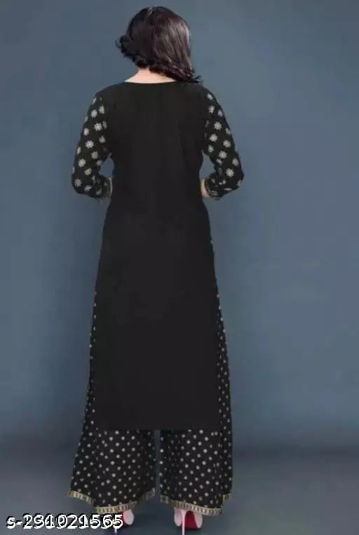 Trendy Rayon Kurta Set with Palazzos, printed net design, three-quarter sleeves. Soft and breathable Indian women's fashion wear