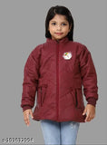 A young girl wearing a burgundy puffer coat with a matching hood