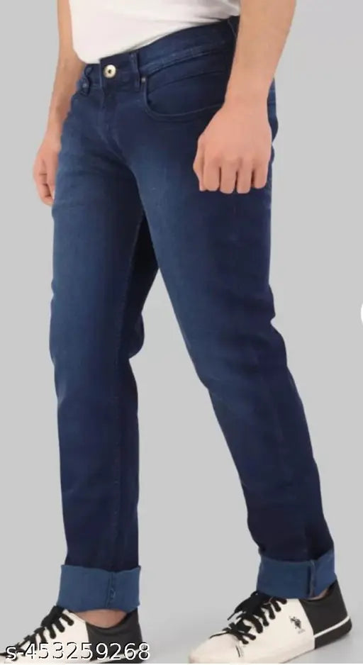 Denim jeans with rolled cuffs and a cuff detail, featuring faded wash areas