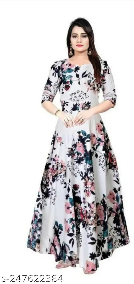 White rayon Anarkali printed gown with three-quarter sleeves and floral design, popular choice for girls' fashion events