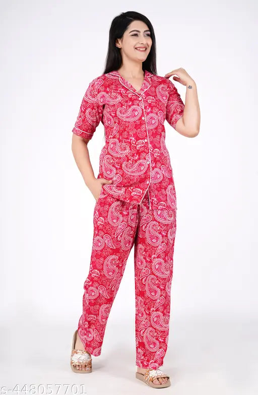 Women's printed rayon night suit top and pajama set, short-sleeved print design on display rack