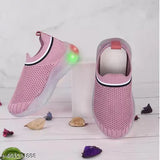 Pink and black unisex LED light-up shoes for kids, featuring white soles with blue LED lights