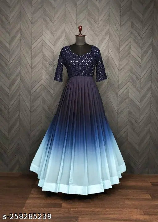 A long, elegant blue and white embroidered wedding dress with a fitted bodice