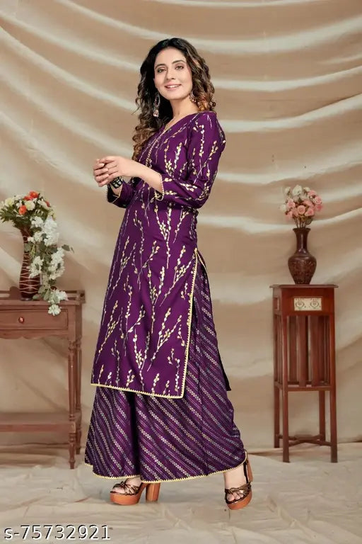 Beautiful foil-printed, round-neck straight kurta with plazo bottom in pure rayon fabric. Party and wedding wear, three-quarter sleeves, trendy Indian attire. Size: L (40/36/44/46), XL (42/38/46/48), XXL (44/40/48/52)