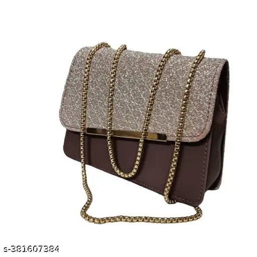 Purple crossbody sling bag with gold chain accents