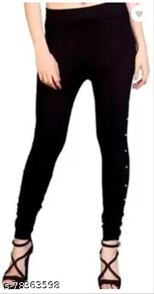 Black cotton blend jeggings, premium quality from FEBRINA CLASSIC for fashionable women. Solid black design, available in sizes 24-32 (waist 24-30, length 38 inches). Made in India