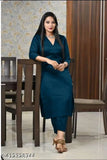 Teal viscose rayon kurta pant set for women and girls, suitable for parties, weddings, office wear. Three-quarter sleeves palazzo style bottomwear