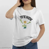 Women's white round neck half sleeve T-shirt, graphic print featuring cute cartoon flower with text