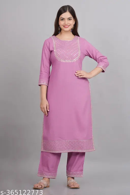 Sequin rayon kurta set for women with three-quarter sleeves and matching rayon pants, solid net design on display