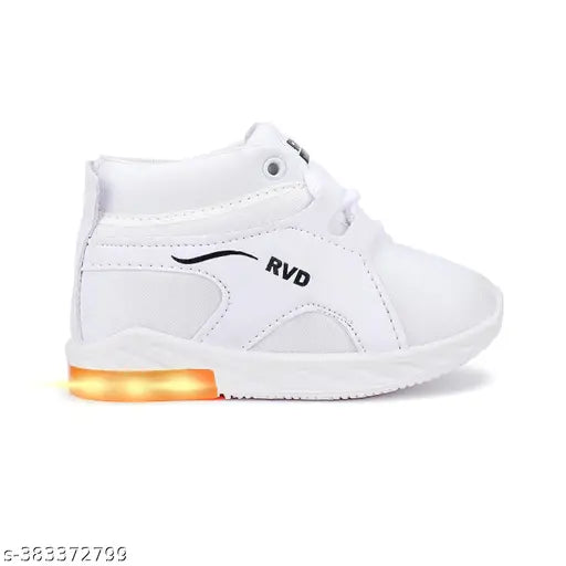 White, lace-up children's shoes with orange neon trim and lighted bottom