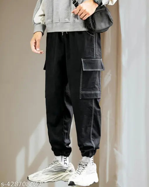 High-quality black Lycra cargos for men - trendy workwear pants with self design pattern, lightweight and soft fabric, perfect for sporty looks. Sizes: 28/28-39-38, 30/30-39-40, 32/32-39-42, 34/34-41-44 (India origin)