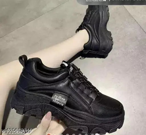 Black synthetic sneaker by Faiter, lace-up fastening with net detail, size 5 (UK)