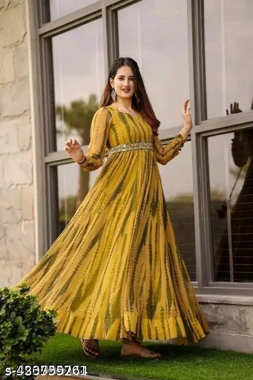 Yellow Georgette printed long kurta with round neck and three-quarter sleeves, perfect for parties and events. Indian maxi gown dress