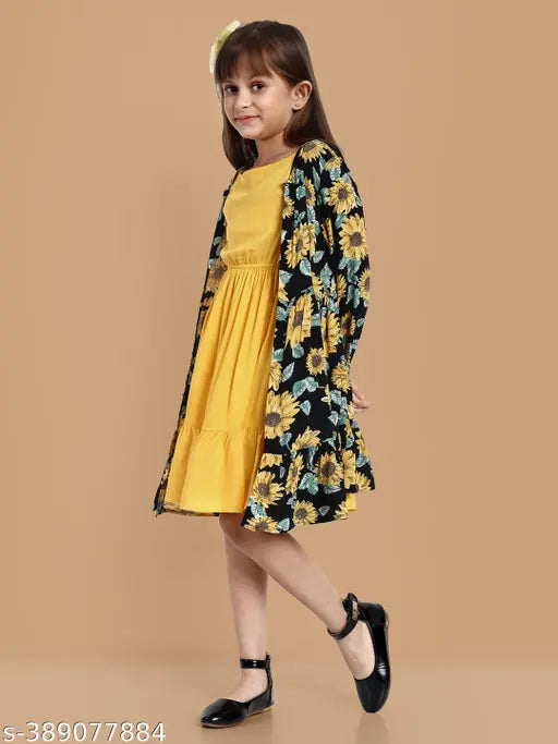 Yellow cotton midi dress with printed shrug for girls aged 11-12 years, featuring long sleeves and a lively Shrak print from India