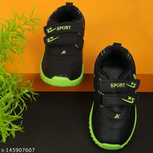Black sports shoes for kids with neon green laces