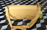 Yellow Faux Leather Slide Closure Handbag with Adjustable Straps, 11-Inch Drop Length