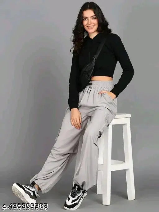 Grey-black polyester MJ fashion pants for men, solid pattern in two sizes: 28 & 30 inches waist, 36 & 37 inches length, 36 & 37 inches hip. Indian origin