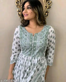 Rayon Green Printed NYRA Cut Kurta-Pant Set, three-quarter sleeves, latest Indian design on display