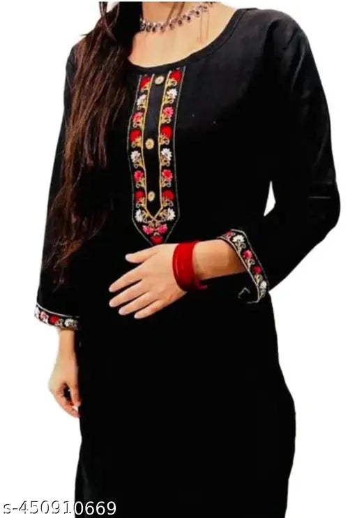 Black long-sleeve tunic with golden embroidery