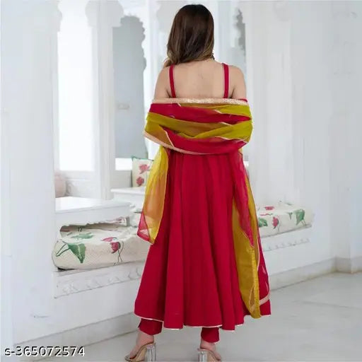 Pink flower rayon kurta set with dupatta and pants, solid net pattern on display