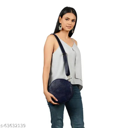 Navy vegan leather round casual sling bag with croc texture