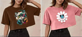 Trendy women's oversized crop T-shirt combo pack, featuring a vibrant floral print on black fabric