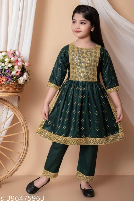 Embroidered Naira cut cotton kurti with palazzo pants for kids girls, latest design in Indian ethnic wear. Three-quarter sleeves, round neck, and calf length. Cotton fabric, no dupatta