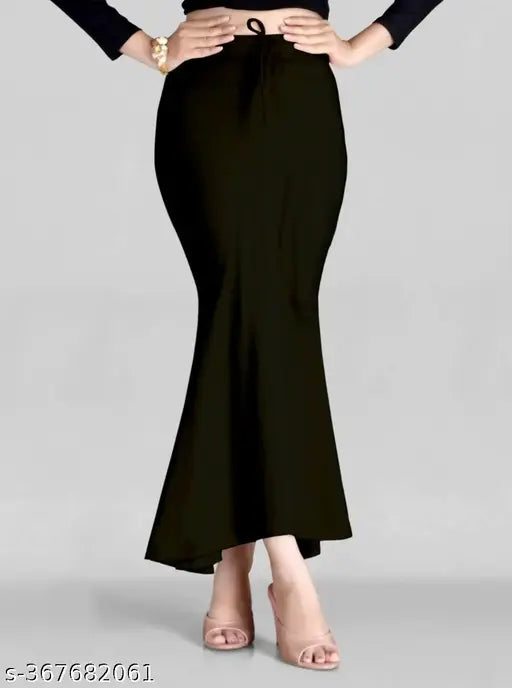 Dark green high-waisted skirt with flared hem and slit detail