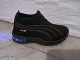 Black LED light up casual sneakers with blue accents for kids