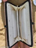 Womens or girls fancy wallet bag, with a flap closure, attracting attention with its elegant design