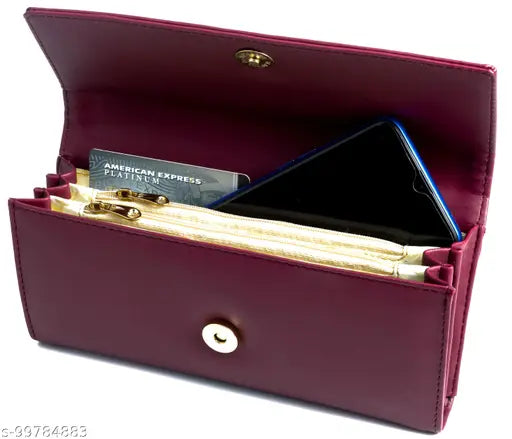 Maroon leather wallet with four card slots, holding a black card