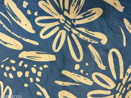 Yellow and blue floral print tablecloth with a design that can be used on both sides