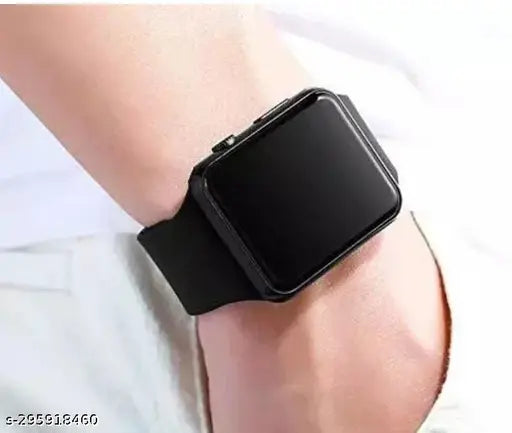 A black digital watch designed for kids, featuring a large LED display and multiple buttons, worn on a wrist