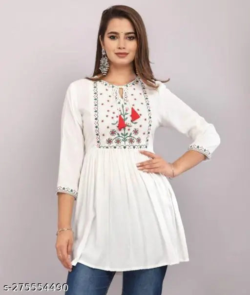White Rayon Pleated Kurti with Ethnic Embroidery, calf-length, round neck, three-quarter sleeves - Indian handcrafted embroidered kurti for daily wear