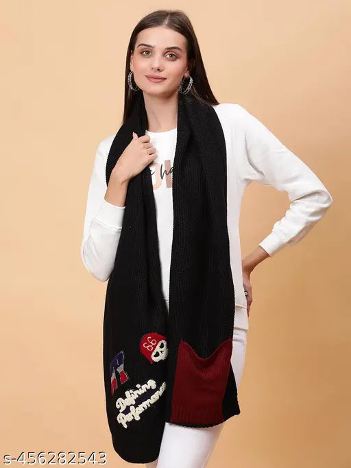 Black wool knitted muffler with embroidered patches, perfect for adding style to casual looks