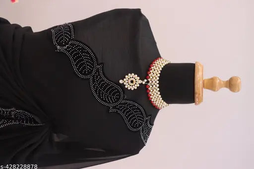 Heavy party wear georgette saree with blouse featuring detailed embroidery and beaded neckline