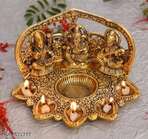 Gold-plated metal Laxmi Ganesh Saraswati idol oil diya, exotic Indian home decor, perfect for Diwali festival season