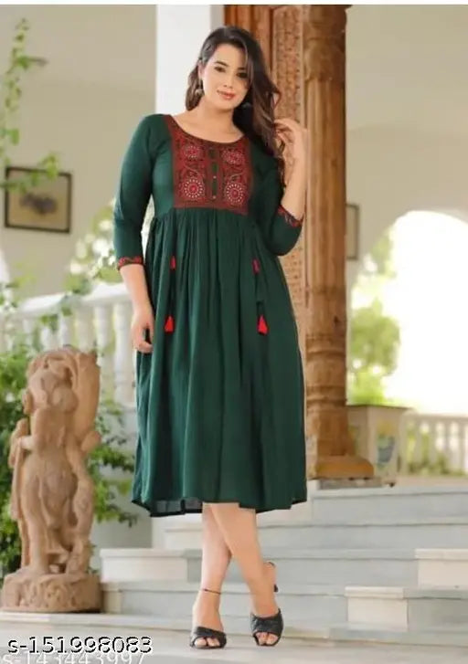 Green Rayon Solid Embroidery Kurta from Cotton India - Elegant three-quarter sleeve Kurti for women, perfect year-round fashion