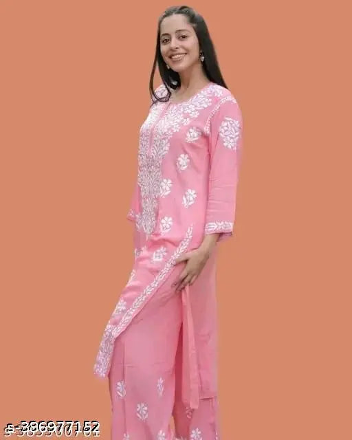 Embroidered rayon kurti and palazzos, three-quarter sleeve Indian fashion set on mannequin