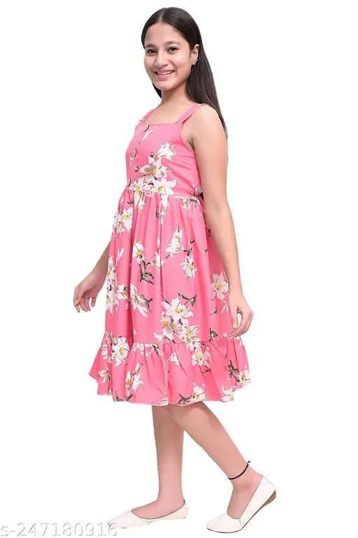 Pink flower print knee-length dress for girls, perfect for parties and everyday wear. Long sleeves, no visible closure