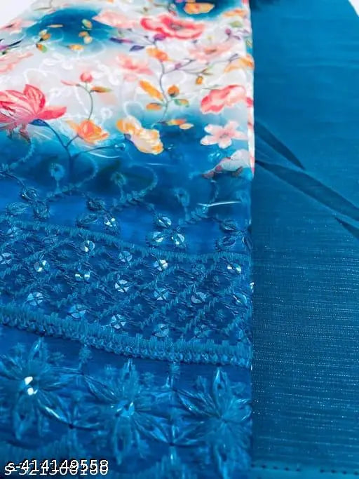 Solid blue Zamato saree with floral embroidery on a separate blouse piece, comfortable fit for women and girls