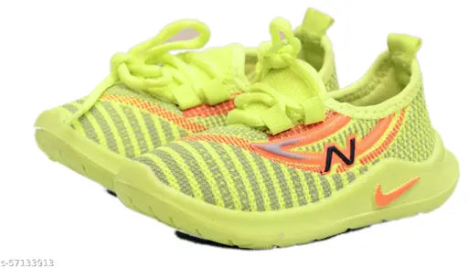 Bright neon yellow and green kids running shoes with black laces