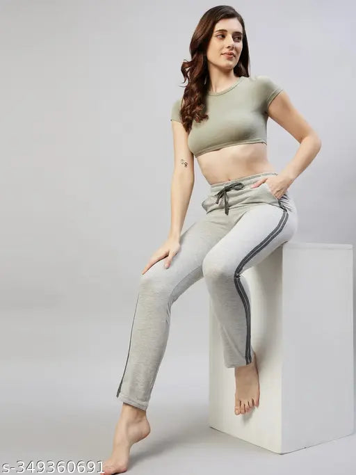 Green athletic track pants, elastic waistband