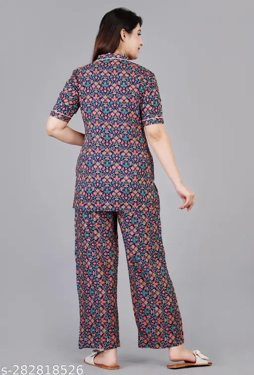 Multicolor rayon women's floral print night suit with three-quarter sleeves, featuring a top and pyjama bottoms