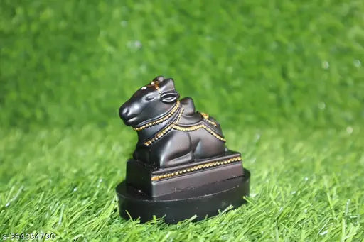 Handcrafted black marble dust Nandi idol with a matt finish, ideal for temple puja or home decor, size 7x5.5x8 cm
