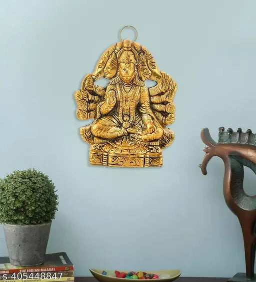 Gold-finished wall hanging of a Hindu deity statue, Panchmukhi Hanuman, with intricate detailing and religious symbolism