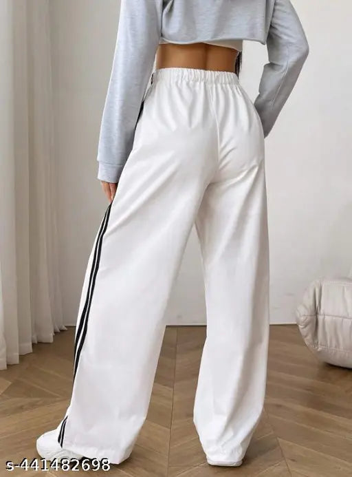 White jogging pants with thin horizontal stripes, cotton material, adjustable drawstring waistband