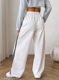White jogging pants with thin horizontal stripes, cotton material, adjustable drawstring waistband